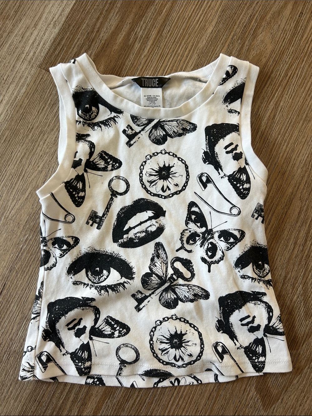Truce Girls' White Graphic Tank Top with Black Motifs